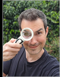Tim looking super cool with a magnifying glass.