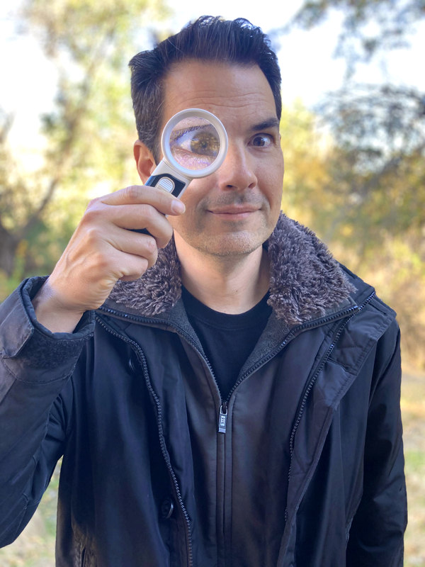 Goofy Tim with magnifying glass.  Photo copyright Anastasia Boomer.